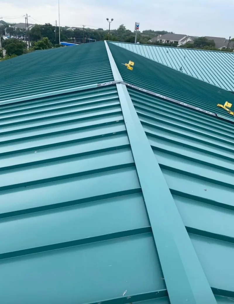 Green commercial metal roof ridge and valley for Metal Roof Repair in Eagle Point